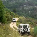 Mountain road adventure vehicles split