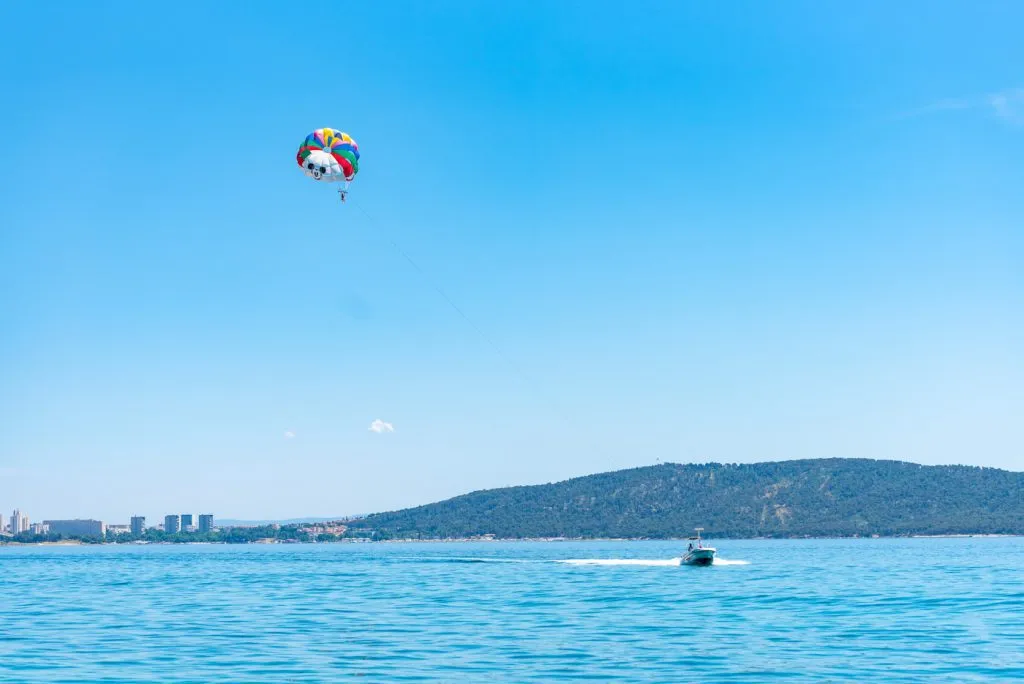 Parasailing over stunning blue waters