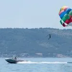 Parasailing over the boat