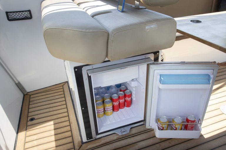 Fridge with cold drinks on board the boat trip in Split